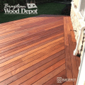 Ipe hardwood stairs and decking in sunlight showing rich tones and smooth surface.
