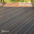 Darkened Cumaru deck surface after oiling, installed with hidden fasteners for a smooth finish.