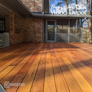 Fresh Cumaru 1×6 solid decking installed on a residential patio, showing warm color variation and premium hardwood decking quality.