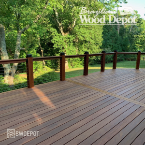 Large backyard deck built with Cumaru 5/4×6 grooved one side decking, showing clean transitions and a smooth border.