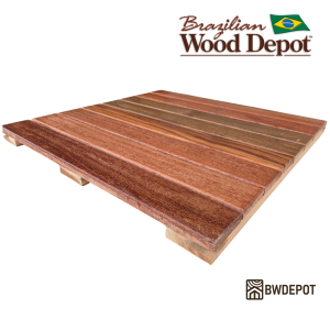 Angled close-up of a 24×24 Cumaru deck tile showing smooth hardwood slats and solid underside support blocks.