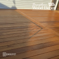 Ipe 1x6 decking with bottom kerf grooves installed in a smooth, modern deck layout with rich brown color variation.