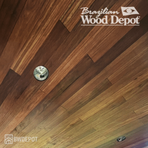 Brown Balau Tongue & Groove Ceiling Application Brown Balau tongue and groove ceiling boards installed overhead in a covered porch application