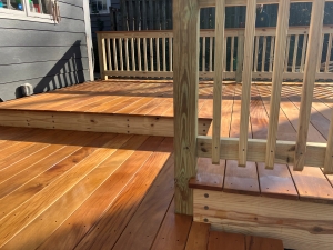 Garapa 1x6 decking detail showing clean surface screw installation near railing