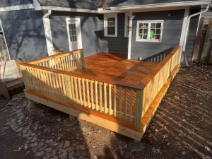 Finished Garapa 1x6 hardwood deck with natural color and clean layout