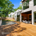 Modern home with pool featuring garapa wood decking installed with hidden fasteners