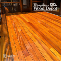 Garapa decking 1x6 installed with hidden fasteners showing rich golden hardwood surface