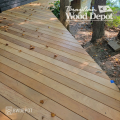 Garapa decking 1x6 perimeter boards installed with hidden fasteners near trees