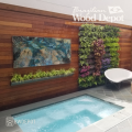 Modern outdoor living space featuring Ipe RainScreen Siding hardwood cladding and architectural feature wall