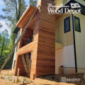 Modern home under construction featuring Tigerwood RainScreen Siding installed on exterior walls and soffits