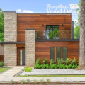 Contemporary luxury home clad with Ipe RainScreen Siding hardwood exterior cladding