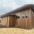 Modern home clad with Brown Balau RainScreen siding