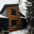 Residential home featuring Garapa RainScreen siding from Brazilian Wood Depot